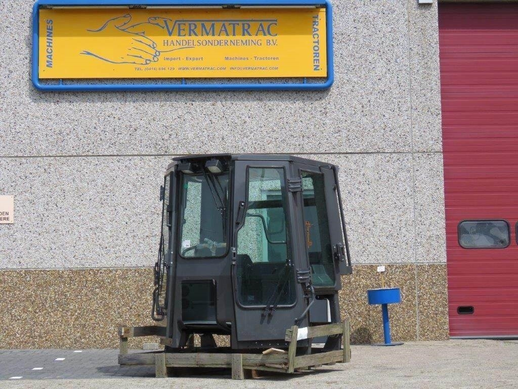 New Holland CE - كابينة - آلات البناء: صورة 1 New Holland CE - كابينة - آلات البناء: صورة 1