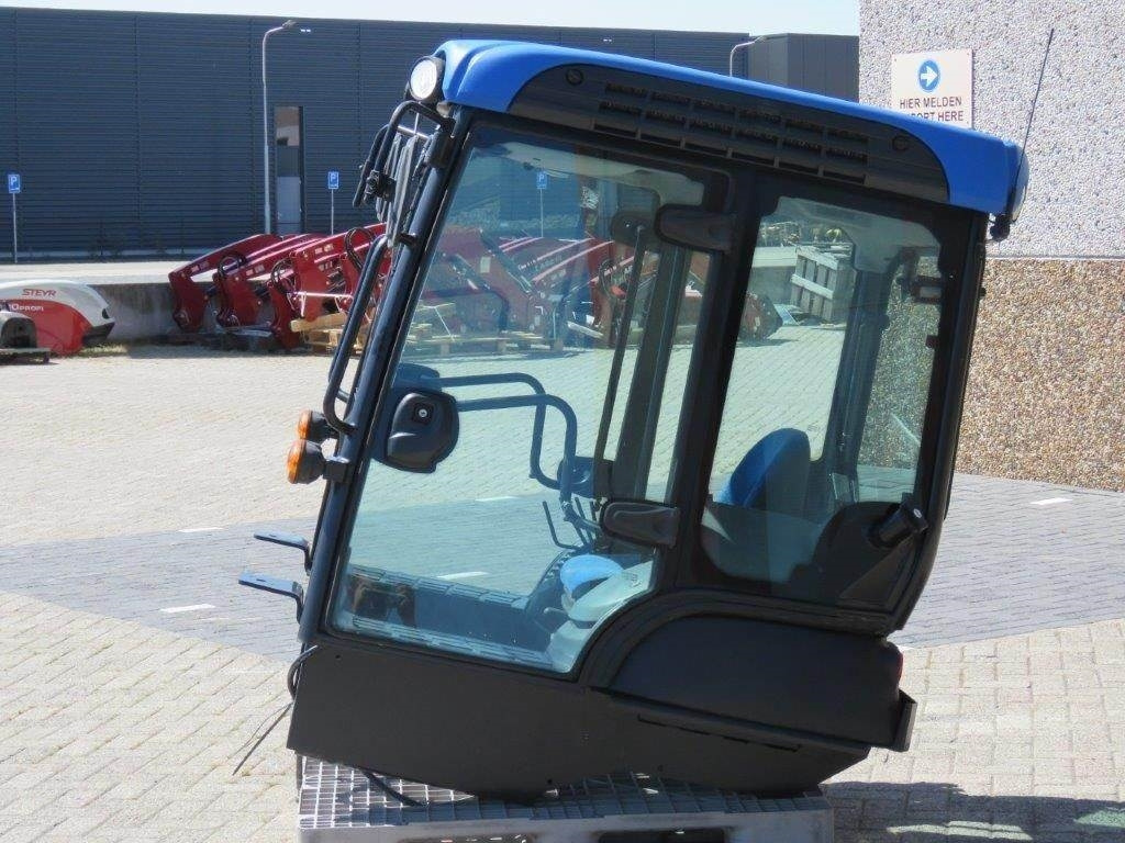 New Holland TK - كابينة - آلات البناء: صورة 3 New Holland TK - كابينة - آلات البناء: صورة 3
