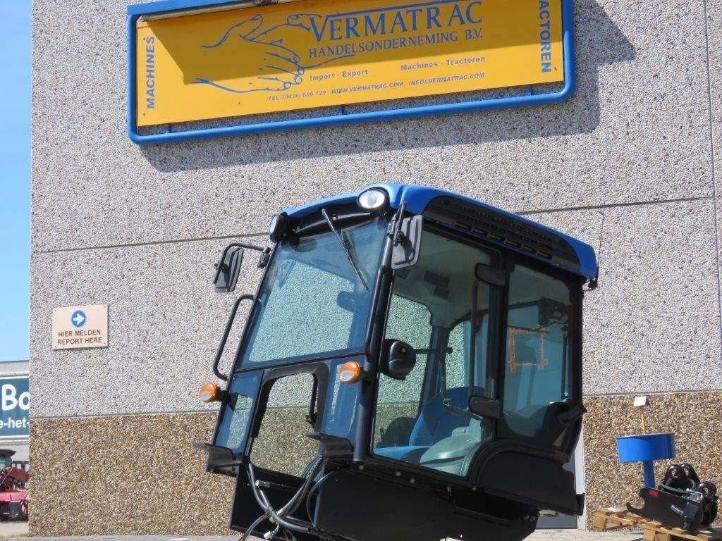 New Holland TK - كابينة - آلات البناء: صورة 1 New Holland TK - كابينة - آلات البناء: صورة 1