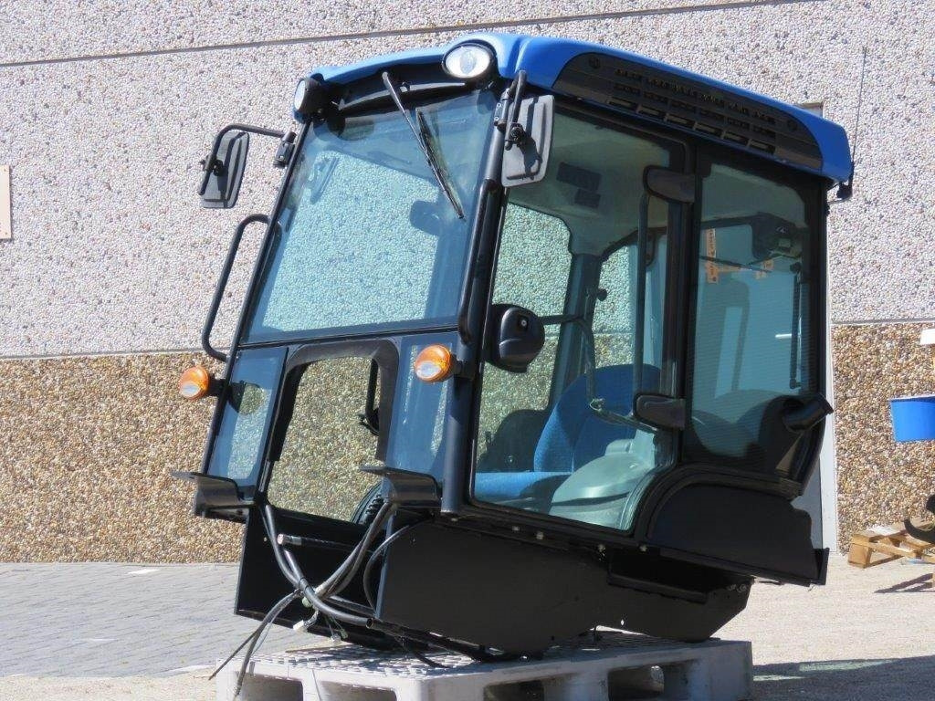 New Holland TK - كابينة - آلات البناء: صورة 2 New Holland TK - كابينة - آلات البناء: صورة 2