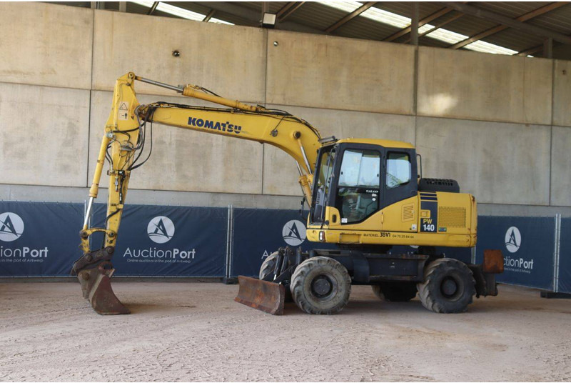Komatsu PW140-7 - حفارة دولاب: صورة 1 Komatsu PW140-7 - حفارة دولاب: صورة 1