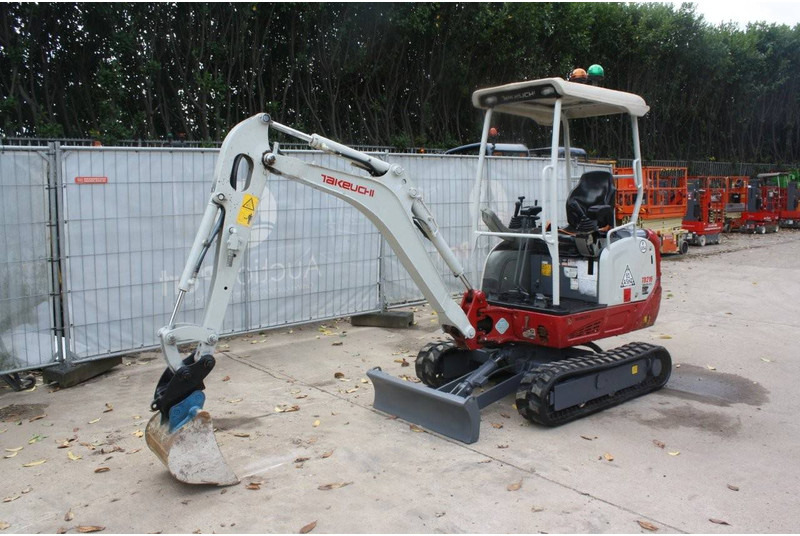 Takeuchi TB216 - حفارة مُصَّغرة: صورة 1 Takeuchi TB216 - حفارة مُصَّغرة: صورة 1
