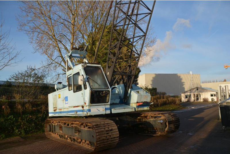 Hitachi KH 125-3 - رافعة مجنزرة: صورة 1 Hitachi KH 125-3 - رافعة مجنزرة: صورة 1