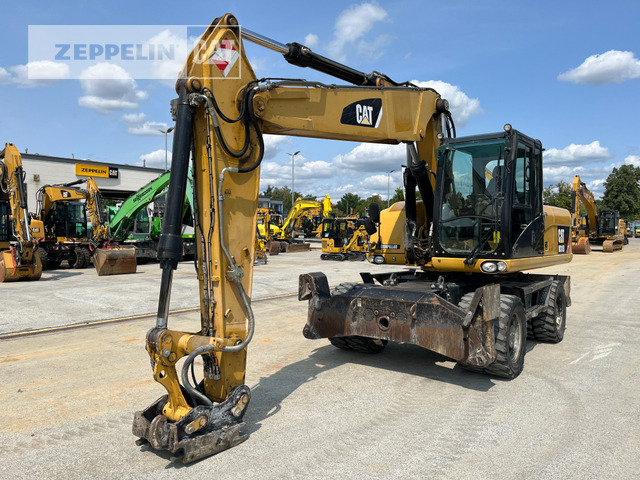 Cat M318D - حفارة دولاب: صورة 1 Cat M318D - حفارة دولاب: صورة 1