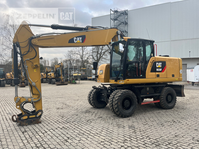 Cat M320F - حفارة دولاب: صورة 1 Cat M320F - حفارة دولاب: صورة 1